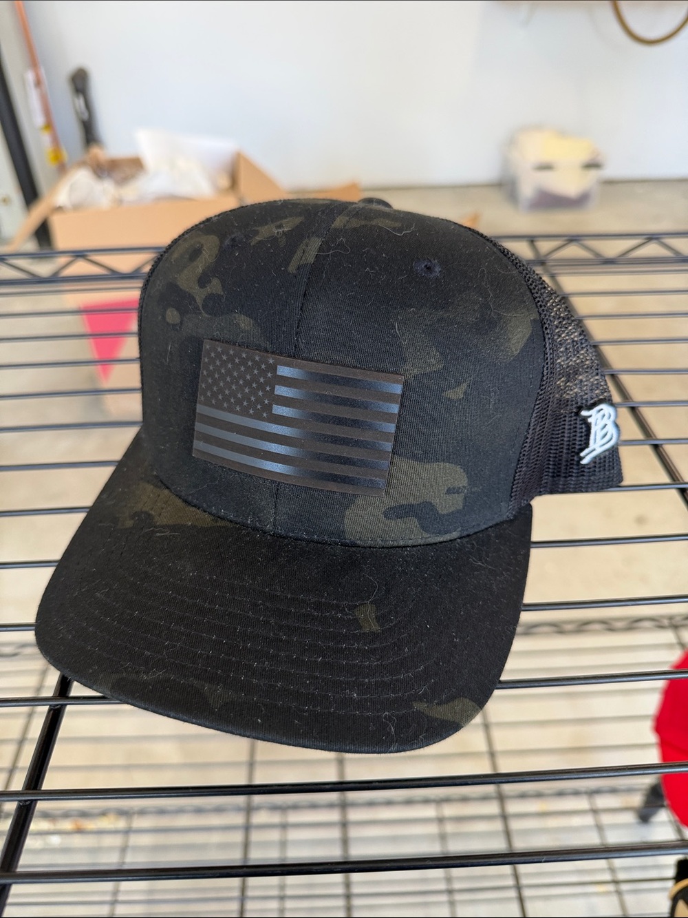 Branded Bills Black Camo Trucker Hat with American Flag Patch
